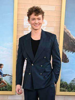 ˜The End of Oak Street™ World Premiere Christian Convery arriving to The End of Oak Street world premiere held at the Steven J. Ross Theater on August 8, 2026 in Burbank, CA. Burbank Steven J. Ross Theater California USA Copyright: xLISAxOConnorx xAFF-USA.comx