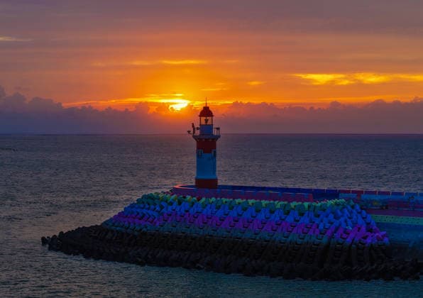 LIANYUNGANG, CHINA - AUGUST 09: Colorful sunset clouds appear over Liandao on August 9, 2026 in Lianyungang, Jiangsu Province of China. The weather phenomenon was influenced by Typhoon Dolphin.  Copyright: xVCGx 111659074167