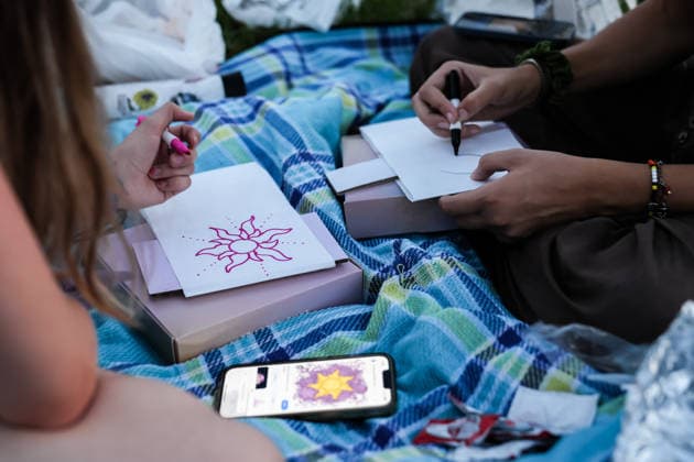 Water Lantern Festival lights up Maryland’s National Harbor in U.S. NATIONAL HARBOR, MARYLAND, UNITED STATES - AUGUST 9: Participants decorate lanterns with drawings and messages during the Washington D.C. Water Lantern Festival at National Harbor SouthPointe in Maryland, United States, on August 9, 2026. The lanterns are later released onto the water along the Potomac River. Hasan Akbas Anadolu National harbor United States. Editorial use only. Please get in touch for any other usage.  Copyright: x2026xAnadoluxHasanxAkbasx