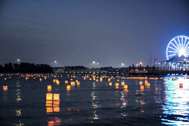 Water Lantern Festival lights up Maryland’s National Harbor in U.S. NATIONAL HARBOR, MARYLAND, UNITED STATES - AUGUST 9: Illuminated lanterns bearing handwritten messages and drawings are seen on the Potomac River during the Washington D.C. Water Lantern Festival at National Harbor SouthPointe in Maryland, United States, on August 9, 2026. Participants release the lanterns onto the water along the Potomac River. Hasan Akbas Anadolu National harbor United States. Editorial use only. Please get in touch for any other usage.  Copyright: x2026xAnadoluxHasanxAkbasx