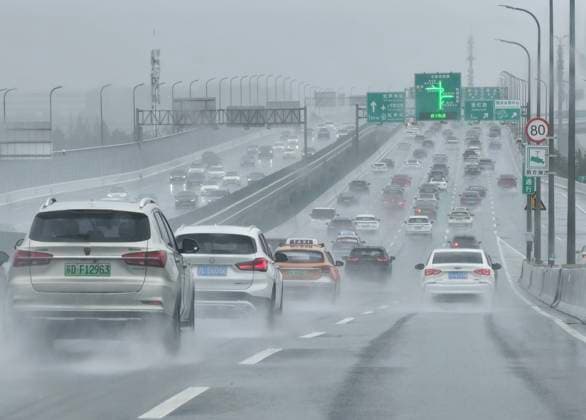 SHANGHAI, CHINA - AUGUST 10: Vehicles are congested on elevated roads due to Typhoon Dolphin on August 10, 2026 in Shanghai, China. Typhoon Dolphin brought heavy rain and strong winds to the city, causing traffic disruptions.  Copyright: xVCGx 111659110631