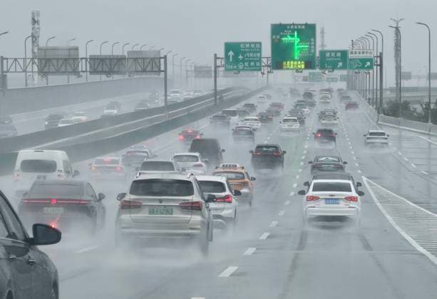 SHANGHAI, CHINA - AUGUST 10: Vehicles are congested on elevated roads due to Typhoon Dolphin on August 10, 2026 in Shanghai, China. Typhoon Dolphin brought heavy rain and strong winds to the city, causing traffic disruptions.  Copyright: xVCGx 111659110633