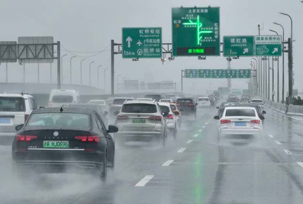 SHANGHAI, CHINA - AUGUST 10: Vehicles are congested on elevated roads due to Typhoon Dolphin on August 10, 2026 in Shanghai, China. Typhoon Dolphin brought heavy rain and strong winds to the city, causing traffic disruptions.  Copyright: xVCGx 111659110637