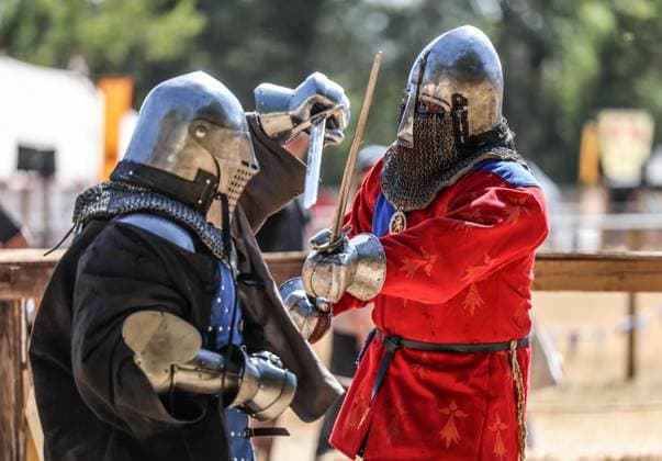 Kingdom of Loxwood medieval festival 09.08.2026. Members of the Full contact medieval armoured combat group Invicta take part in mass combat at the Kingdom of Loxwood medieval festival in west Sussex  Copyright: xRichardxPohlex NINTCHDBPICT001100253859