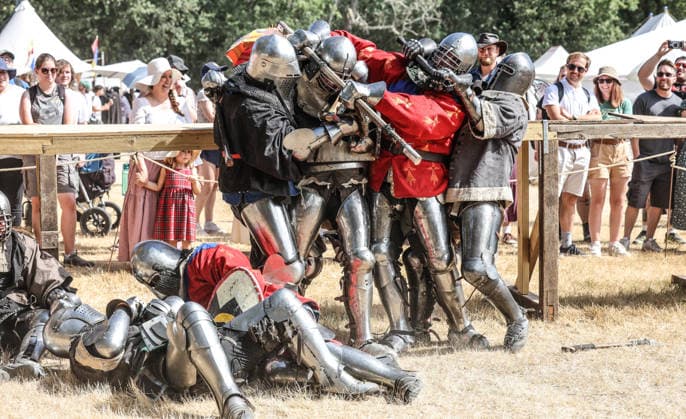 Kingdom of Loxwood medieval festival 09.08.2026. Members of the Full contact medieval armoured combat group Invicta take part in mass combat at the Kingdom of Loxwood medieval festival in west Sussex  Copyright: xRichardxPohlex NINTCHDBPICT001100254180