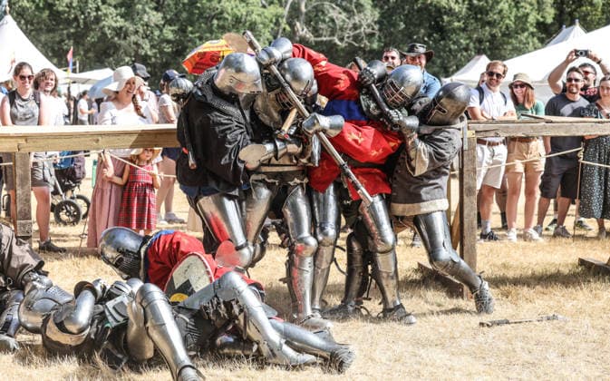 Kingdom of Loxwood medieval festival 09.08.2026. Members of the Full contact medieval armoured combat group Invicta take part in mass combat at the Kingdom of Loxwood medieval festival in west Sussex  Copyright: xRichardxPohlex NINTCHDBPICT001100254312