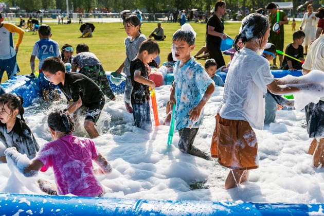 GUIYANG, CHINA - AUGUST 09: Citizens and tourists splash water on each other during the Summer Wonderland Ethnic Group Celebration at Guanshanhu Park on August 9, 2026 in Guiyang, Guizhou Province of China. The event features water splashing activities allowing participants to cool off during the summer heat.  Copyright: xVCGx 111659117649