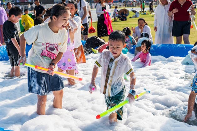 GUIYANG, CHINA - AUGUST 09: Citizens and tourists splash water on each other during the Summer Wonderland Ethnic Group Celebration at Guanshanhu Park on August 9, 2026 in Guiyang, Guizhou Province of China. The event features water splashing activities allowing participants to cool off during the summer heat.  Copyright: xVCGx 111659117650