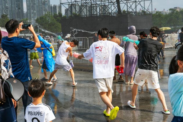 GUIYANG, CHINA - AUGUST 09: Citizens and tourists splash water on each other during the Summer Wonderland Ethnic Group Celebration at Guanshanhu Park on August 9, 2026 in Guiyang, Guizhou Province of China. The event features water splashing activities allowing participants to cool off during the summer heat.  Copyright: xVCGx 111659117641