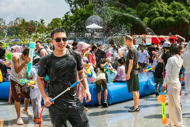 GUIYANG, CHINA - AUGUST 09: Citizens and tourists splash water on each other during the Summer Wonderland Ethnic Group Celebration at Guanshanhu Park on August 9, 2026 in Guiyang, Guizhou Province of China. The event features water splashing activities allowing participants to cool off during the summer heat.  Copyright: xVCGx 111659117634