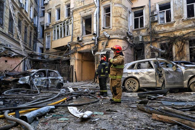 State Emergency Service workers deal with the aftermath of a Russian strike in the courtyard of a multi-storey apartment block, Odesa, Ukraine, August 9, 2026. On Sunday night, August 9, the Russian army carried out a massive combined attack on Odesa, causing significant destruction in two districts of the southern Ukrainian port city. In central Odesa, a Russian missile hit a four-storey residential building, where two floors were completely burnt out. Two private houses and offices were also damaged. At least six civilian cars were destroyed or badly damaged in courtyards by falling debris and direct hits. Damage to energy facilities led to a temporary blackout, with partial power outages in the Peresypskyi (Poskot), Prymorskyi, Khadzhybe  Copyright: xNinaxLiashonokx