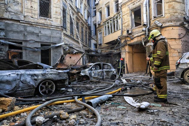 State Emergency Service workers deal with the aftermath of a Russian strike in the courtyard of a multi-storey apartment block, Odesa, Ukraine, August 9, 2026. On Sunday night, August 9, the Russian army carried out a massive combined attack on Odesa, causing significant destruction in two districts of the southern Ukrainian port city. In central Odesa, a Russian missile hit a four-storey residential building, where two floors were completely burnt out. Two private houses and offices were also damaged. At least six civilian cars were destroyed or badly damaged in courtyards by falling debris and direct hits. Damage to energy facilities led to a temporary blackout, with partial power outages in the Peresypskyi (Poskot), Prymorskyi, Khadzhybe  Copyright: xNinaxLiashonokx