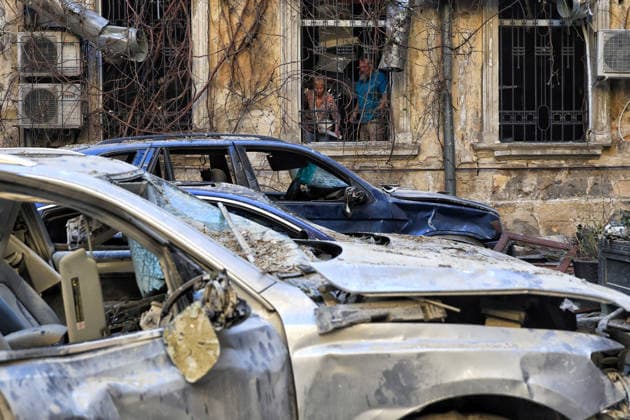 Russian troops launch massive combined attack on Odesa A man and a woman stand in the window as burnt-out cars stay in the courtyard of a multi-storey apartment block in the historical city centre damaged by a Russian attack, Odesa, Ukraine, August 9, 2026. On Sunday night, August 9, the Russian army carried out a massive combined attack on Odesa, causing significant destruction in two districts of the southern Ukrainian port city. In central Odesa, a Russian missile hit a four-storey residential building, where two floors were completely burnt out. Two private houses and offices were also damaged. At least six civilian cars were destroyed or badly damaged in courtyards by falling debris and direct hits. Damage to energy facilities led to a  Copyright: xNinaxLiashonokx xUkrinformx xAvalonx 1122038522