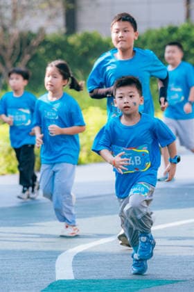 SHENZHEN, CHINA - AUGUST 08: Participants take part in the Run, Teenagers 2026 Longgang District National Fitness Day themed event at Shenzhen Universiade Sports Centre on August 8, 2026 in Longgang District, Shenzhen City, Guangdong Province of China. The event marks the 18th National Fitness Day, featuring a morning run followed by water gun battles and a music party to promote public fitness.  Copyright: xVCGx 111659152139
