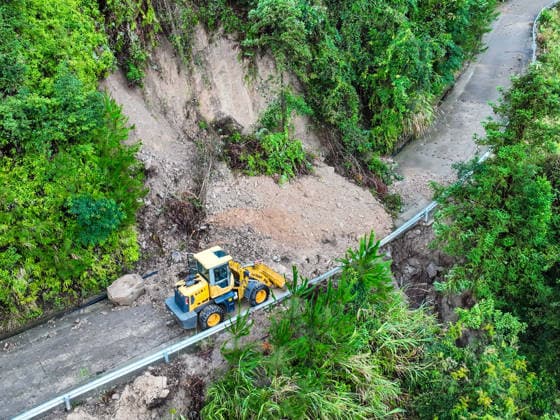 (260810) -- WENZHOU, Aug. 10, 2026 -- An aerial drone photo taken on Aug. 10, 2026 shows an excavator carrying out emergency repairs on a mountain road blocked by a landslide in Yongjia County in Wenzhou, east China s Zhejiang Province. Typhoon Dolphin is moving inland after making two landfalls along the coast of east China s Zhejiang Province and is expected to bring heavy precipitation to more than 10 provincial-level regions, according to China s National Meteorological Center on Monday. ) CHINA-ZHEJIANG-WENZHOU-TYPHOON DOLPHIN-IMPACT (CN) JiangxHan 