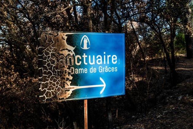 Aftermath of Wildfire in The Var - France The entrance signs to the Notre-Dame-de-Grace Shrine, damaged by the wildfire in Gros Bessillon, in Cotignac, France, on August 10, 2026. Photo by Laurent Coust ABACAPRESS.COM Cotignac France  Copyright: xCoustxLaurent ABACAx