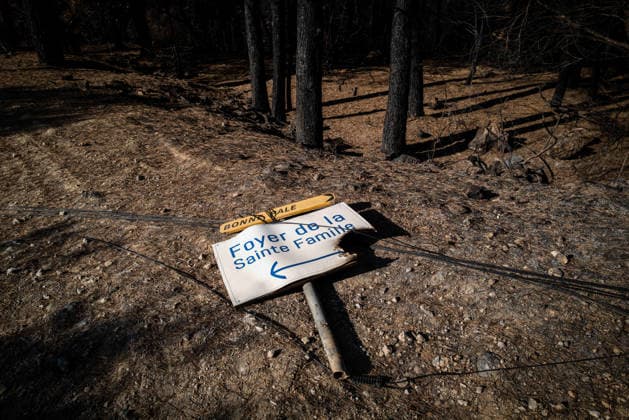 Aftermath of Wildfire in The Var - France A sign pointing toward the Foyer de la Sainte Famille and an electrical pole destroyed during the Gros Bessillon fire near the Notre-Dame-de-Grace Shrine in Cotignac, France, on August 10, 2026. Photo by Laurent Coust ABACAPRESS.COM Cotignac France  Copyright: xCoustxLaurent ABACAx