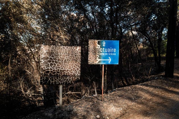 Aftermath of Wildfire in The Var - France The entrance signs to the Notre-Dame-de-Grace Shrine, damaged by the wildfire in Gros Bessillon, in Cotignac, France, on August 10, 2026. Photo by Laurent Coust ABACAPRESS.COM Cotignac France  Copyright: xCoustxLaurent ABACAx