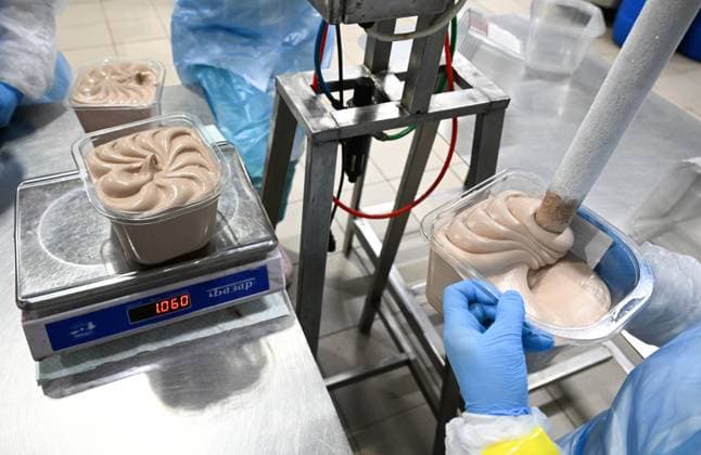 Russia Food Industry 9220037 10.08.2026 An employee works on an ice cream production line at the Chistaya Liniya (Clean Line) plant, in Moscow Region, Russia. Maksim Blinov Sputnik Moscow region Russia  Copyright: xMaksimxBlinovx