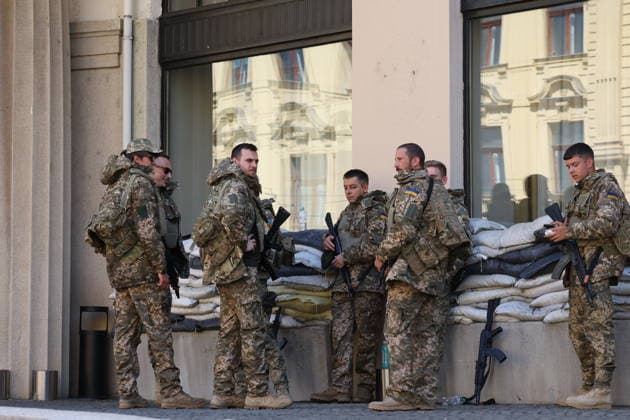 Zagreb, Croatia,100826 Filming of a movie about the war in Ukraine, directed by Doug Liman, outside the famous Hotel Esplanade in Zagreb, featuring Hollywood stars Sean Penn and Adrien Brody. Pictured: actors portraying Ukrainian soldiers. Photo: Ranko Suvar CROPIX Zagreb Croatia Copyright: xxRankoxSuvarx esplanade_film2-100826