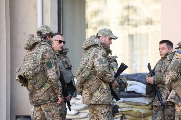 Zagreb, Croatia,100826 Filming of a movie about the war in Ukraine, directed by Doug Liman, outside the famous Hotel Esplanade in Zagreb, featuring Hollywood stars Sean Penn and Adrien Brody. Pictured: actors portraying Ukrainian soldiers. Photo: Ranko Suvar CROPIX Zagreb Croatia Copyright: xxRankoxSuvarx esplanade_film3-100826