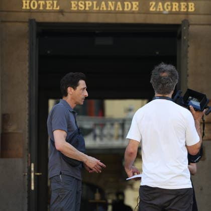 Zagreb, Croatia,100826 Filming of a movie about the war in Ukraine, directed by Doug Liman, outside the famous Hotel Esplanade in Zagreb, featuring Hollywood stars Sean Penn and Adrien Brody. Pictured: Adrien Brody. Photo: Ranko Suvar CROPIX Zagreb Croatia Copyright: xxRankoxSuvarx esplanade_film31-100826