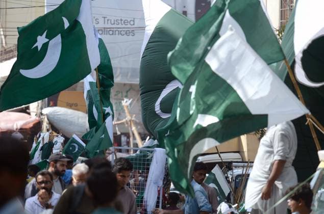 August 10, 2026, Pakistan: Independence Day Preparations in Karachi: Roadside Stalls in Papers Market Sell Pakistan Flags and More Ahead of 79th Celebration Pakistan  - ZUMAas3_ 20260810_zaf_as3_011 Copyright: xPPIx