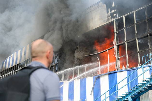 RUSSIA, DONETSK PEOPLE S REPUBLIC - AUGUST 10, 2026: A fire breaks out after a Ukrainian drone strike on the Galaktika Galaxy shopping centre in Makeyevka, east of Donetsk. Dmitry Yagodkin TASS  95999084