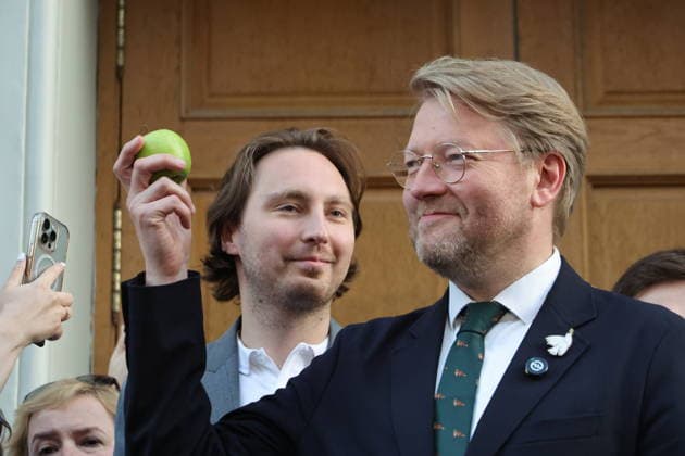 RUSSIA, MOSCOW - AUGUST 10, 2026: Nikolai Rybakov (front), Chairman of the Yabloko Russian United Democratic Party, appears outside after a Russian Supreme Court hearing into a bid by Rodina to disqualify Yabloko from the 2026 State Duma election. Yevgeny Messman TASS  96000186