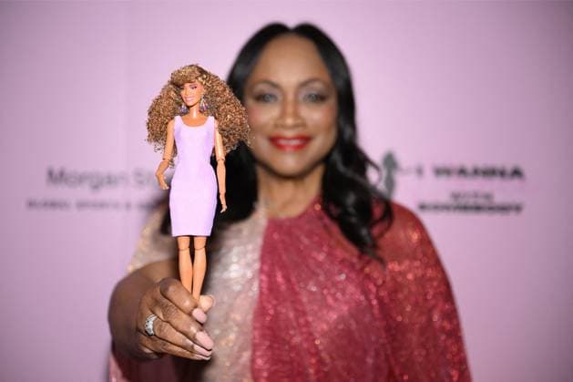 Whitney Houston Barbie doll unveiled by her sister-in-law and former manager Pat Houston at the Fifth Legacy of Love Gala in Atlanta on August 8 The first-ever Whitney Houston Barbie doll was unveiled by her sister-in-law and former manager Pat Houston, who revealed it was 20 years in the making., , Pat, who is also executor of the late singer’s estate, unveiled the doll at the Fifth Legacy of Love Gala, an annual event hosted by the Whitney E. Houston Legacy Foundation, in Atlanta on Friday (AUGUST 8)., , The Barbie Signature Whitney Houston Doll recreates Whitney’s look in the 1987 music video for her huge hit I Wanna Dance with Somebody (Who Loves Me) ., , Pat worked closely with the Barbie design team to help shape the doll’s look, for  Copyright: xThexMegaxAgencyxDerekxWhitexforxMattelxInc Megax