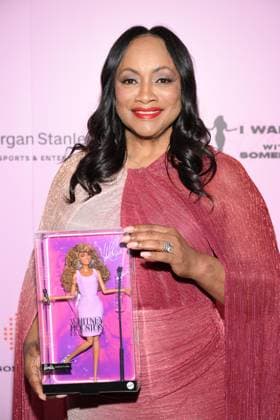 Whitney Houston Barbie doll unveiled by her sister-in-law and former manager Pat Houston at the Fifth Legacy of Love Gala in Atlanta on August 8 The first-ever Whitney Houston Barbie doll was unveiled by her sister-in-law and former manager Pat Houston, who revealed it was 20 years in the making., , Pat, who is also executor of the late singer’s estate, unveiled the doll at the Fifth Legacy of Love Gala, an annual event hosted by the Whitney E. Houston Legacy Foundation, in Atlanta on Saturday (AUGUST 8)., , The Barbie Signature Whitney Houston Doll recreates Whitney’s look in the 1987 music video for her huge hit I Wanna Dance with Somebody (Who Loves Me) ., , Pat worked closely with the Barbie design team to help shape the doll’s look, f  Copyright: xThexMegaxAgencyxDerekxWhitexforxMattelxInc Megax