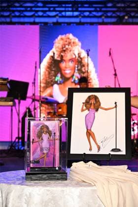 Whitney Houston Barbie doll unveiled by her sister-in-law and former manager Pat Houston at the Fifth Legacy of Love Gala in Atlanta on August 8 The first-ever Whitney Houston Barbie doll was unveiled by her sister-in-law and former manager Pat Houston, who revealed it was 20 years in the making., , Pat, who is also executor of the late singer’s estate, unveiled the doll at the Fifth Legacy of Love Gala, an annual event hosted by the Whitney E. Houston Legacy Foundation, in Atlanta on Saturday (AUGUST 8)., , The Barbie Signature Whitney Houston Doll recreates Whitney’s look in the 1987 music video for her huge hit I Wanna Dance with Somebody (Who Loves Me) ., , Pat worked closely with the Barbie design team to help shape the doll’s look, f  Copyright: xThexMegaxAgencyxDerekxWhitexforxMattelxInc Megax
