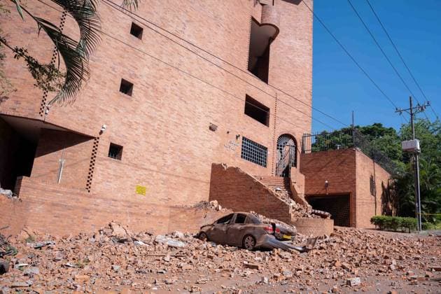 (260810) -- CALI, Aug. 10, 2026 -- Photo taken on Aug. 10, 2026 shows a damaged car after an earthquake in Cali, Colombia. Colombia declared a state of national disaster on Monday after a magnitude 7.4 earthquake uck the country s west earlier in the day and killed more than 70 people nationwide. ( Xinhua) COLOMBIA-CALI-EARTHQUAKE-AFTERMATH STR 