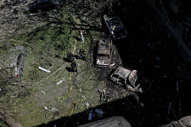 Rescue workers deal with the aftermath of a Russian air strike, Zaporizhzhia, Ukraine, August 10, 2026. Russian forces attacked civilian infrastructure in the regional capital and the Zaporizhzhia district with guided aerial bombs. Apartment blocks and private houses were damaged, and cars were wrecked. At least 24 people were injured, including two children. (Photo by Dmytro Smolienko Ukrinform) Russian army attacks Zaporizhzhia with guided bombs again  Copyright: xDmytroxSmolienkox
