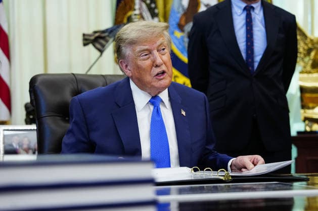 US President Donald Trump speaks before signing an executive order that reevaluates childhood vaccines in the Oval Office of the White House in Washington, DC on August 10, 2026. While the executive order still recommends childhood vaccines for 11 diseases, including measles and polio, it calls for limiting vaccines for other diseases, like hepatitis A and B and meningococcal disease, to high-risk populations.  WAP20260810101 BONNIExCASH