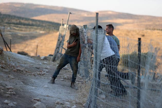 Israeli settlers raid village of Taybeh in Ramallah RAMALLAH, WEST BANK, PALESTINE - AUGUST 10 : Israeli settlers continue their raids on the Christian village of Taybeh, causing concern among local residents despite the Israeli army declaring the area a closed military zone, on August 10, 2026 in Ramallah, West Bank, Palestine. Issam Rimawi Anadolu Ramallah West Bank. Editorial use only. Please get in touch for any other usage.  Copyright: x2026xAnadoluxIssamxRimawix