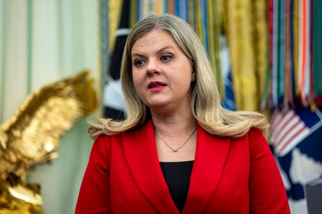 White House Domestic Policy Council Deputy Director Heidi Overton speaks during an executive order that reevaluates childhood vaccines in the Oval Office of the White House in Washington, DC on August 10, 2026. While the executive order still recommends childhood vaccines for 11 diseases, including measles and polio, it calls for limiting vaccines for other diseases, like hepatitis A and B and meningococcal disease, to high-risk populations.  WAP20260810351 BONNIExCASH