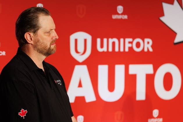 August 10, 2026, Toronto, On, Canada: Trevor Longpre, Unifor General Motors Master Bargaining Committee Chairperson looks on at a press conference as Unifor opens negotiations with General Motors in Toronto, on Monday, Aug. 10, 2026. Toronto Canada  - ZUMAc35_ 20260810_zaf_c35_020 Copyright: xKeitoxNewmanx