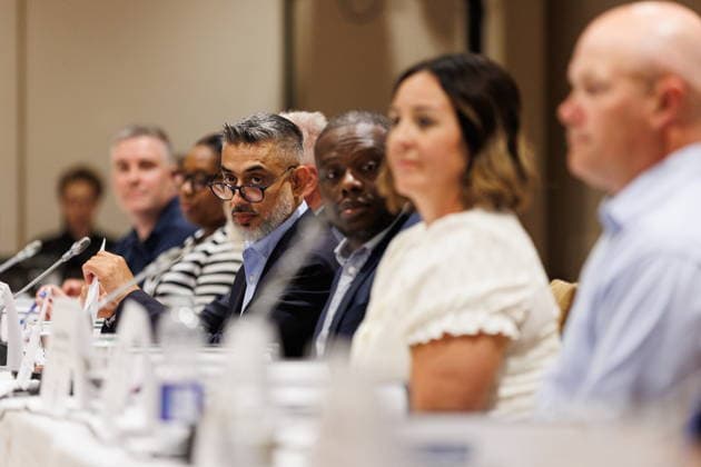 August 10, 2026, Toronto, On, Canada: Jack Uppal, centre left, President and Managing Director, GM Canada sits alongside representatives from GM as Unifor opens negotiations with General Motors in Toronto, on Monday, Aug. 10, 2026. Toronto Canada  - ZUMAc35_ 20260810_zaf_c35_012 Copyright: xKeitoxNewmanx