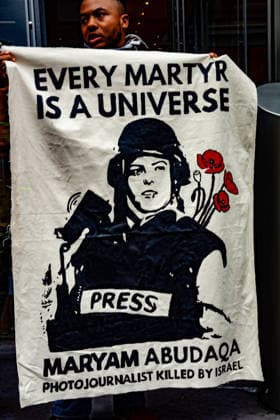 August 10, 2026, New York, New York, USA: The Palestinian Youth Movemement brought their protest to the doorstep of the New York Times, accusing the newspaper of being complicit in the killings of Gazan journalists on the anniversary of the death of Anas al-Sharif, a journalist killed in Gaza. Carrying signs shaped as bullet-proof vests with the names of the journalists killed in the ongoing US-Israeli war. New York USA - ZUMAa251 20260810_znp_a251_004 Copyright: xDianaxApfelbacherx