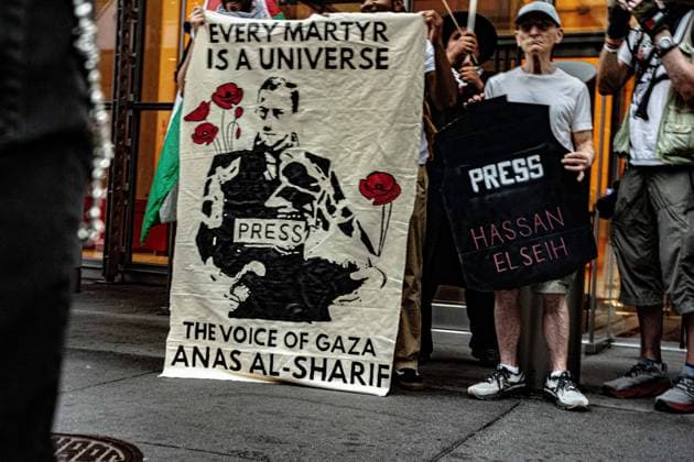 August 10, 2026, New York, New York, USA: The New York Times became the center of protest for the Palestinian Youth Movement today where they held a protest to commemorate the anniversary of the death of Anas al-Sharif, a Gazan journalist killed in the Israeli-Palestine war. They accuse the newspaper of being complicit in the killings of Gazan journalists. New York USA - ZUMAa251 20260810_znp_a251_008 Copyright: xDianaxApfelbacherx