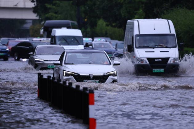 SHANGHAI, CHINA - AUGUST 10: A general view shows waterlogged roads and heavy rain along Hongqiao Road and the Inner Ring Elevated Road as Typhoon Dolphin brings strong winds and extreme rainfall to the city on August 10, 2026 in Shanghai, China. Local authorities reported accumulated rainfall reached extreme levels in some areas, causing flooding on multiple road sections.  Copyright: xVCGx 111659181721