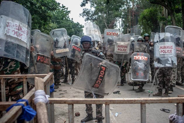 August 10, 2026, Ranchi, India: Police officers holding batons and protective shields stand in position during a confrontation with students. Students staged a march to the state assembly, amplifying ongoing protests against alleged irregularities in examinations conducted by the Jharkhand Public Service Commission and the Jharkhand Staff Selection Commission. Ranchi India  - ZUMAs197 20260810_aaa_s197_059 Copyright: xYousufxSarfarazx
