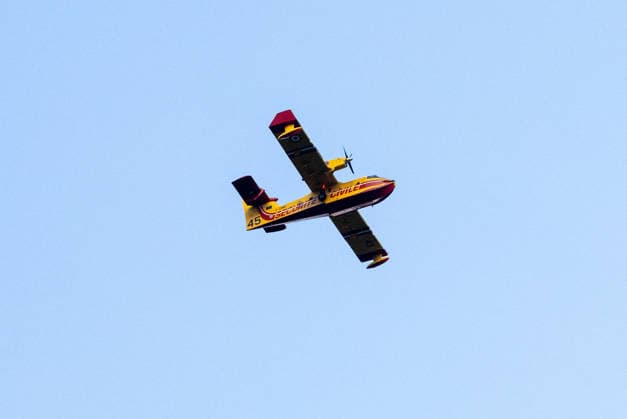 Canadair Aircraft Scoops Water From Lake Monteynard To Fight Fire In Treffort - France A Canadair water bomber flies in the sky after scooping water from Lake Monteynard to fight a fire in the Drôme, in Treffort, France on August 10, 2026. Photo by Arnaud Bertrand ABACAPRESS.COM Treffort France  Copyright: xBertrandxArnaud ABACAx