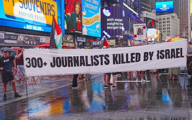 Rally for Anas Al-Sharif and the journalists of Gaza in New York NEW YORK, UNITED STATES - AUGUST 10: Protesters hold a banner marching to Times Square after picketing The New York Times to demand justice for Palestinian journalist Anas Al-Sharif and all journalists killed in Gaza by Israel, on August 10, 2026, in New York City, United States. Selcuk Acar Anadolu New York United States. Editorial use only. Please get in touch for any other usage.  Copyright: x2026xAnadoluxSelcukxAcarx