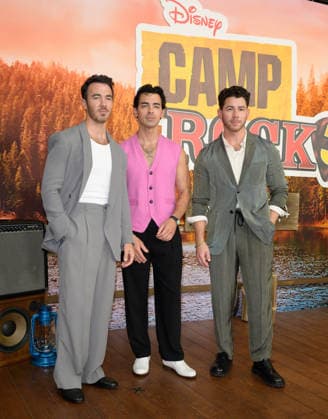 BURBANK, USA, August 10, 2026: Kevin Jonas, Joe Jonas, and Nick Jonas at the world premiere of Disney s *Camp Rock 3* at the Walt Disney Studio Lot. Photo by Paul Smith, Featureflash 458817, August 10, 2026, Burbank, CA  Copyright: xPaulxSmithx xFeaturesxFlashx xStarfacex STAR_458817_001