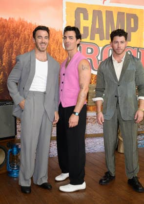 BURBANK, USA, August 10, 2026: Kevin Jonas, Joe Jonas, and Nick Jonas at the world premiere of Disney s *Camp Rock 3* at the Walt Disney Studio Lot. Photo by Paul Smith, Featureflash 458817, August 10, 2026, Burbank, CA  Copyright: xPaulxSmithx xFeaturesxFlashx xStarfacex STAR_458817_002
