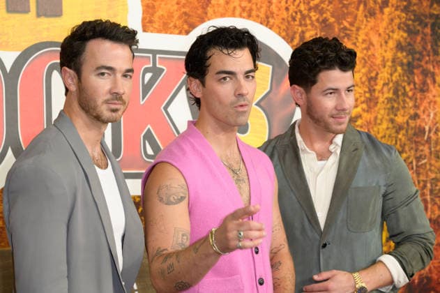 BURBANK, USA, August 10, 2026: Kevin Jonas, Joe Jonas, and Nick Jonas at the world premiere of Disney s *Camp Rock 3* at the Walt Disney Studio Lot. Photo by Paul Smith, Featureflash 458817, August 10, 2026, Burbank, CA  Copyright: xPaulxSmithx xFeaturesxFlashx xStarfacex STAR_458817_004