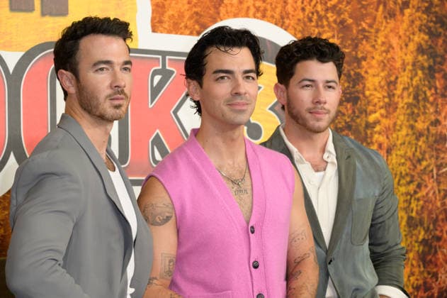 BURBANK, USA, August 10, 2026: Kevin Jonas, Joe Jonas, and Nick Jonas at the world premiere of Disney s *Camp Rock 3* at the Walt Disney Studio Lot. Photo by Paul Smith, Featureflash 458817, August 10, 2026, Burbank, CA  Copyright: xPaulxSmithx xFeaturesxFlashx xStarfacex STAR_458817_005