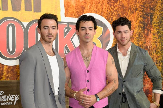 BURBANK, USA, August 10, 2026: Kevin Jonas, Joe Jonas, and Nick Jonas at the world premiere of Disney s *Camp Rock 3* at the Walt Disney Studio Lot. Photo by Paul Smith, Featureflash 458817, August 10, 2026, Burbank, CA  Copyright: xPaulxSmithx xFeaturesxFlashx xStarfacex STAR_458817_007